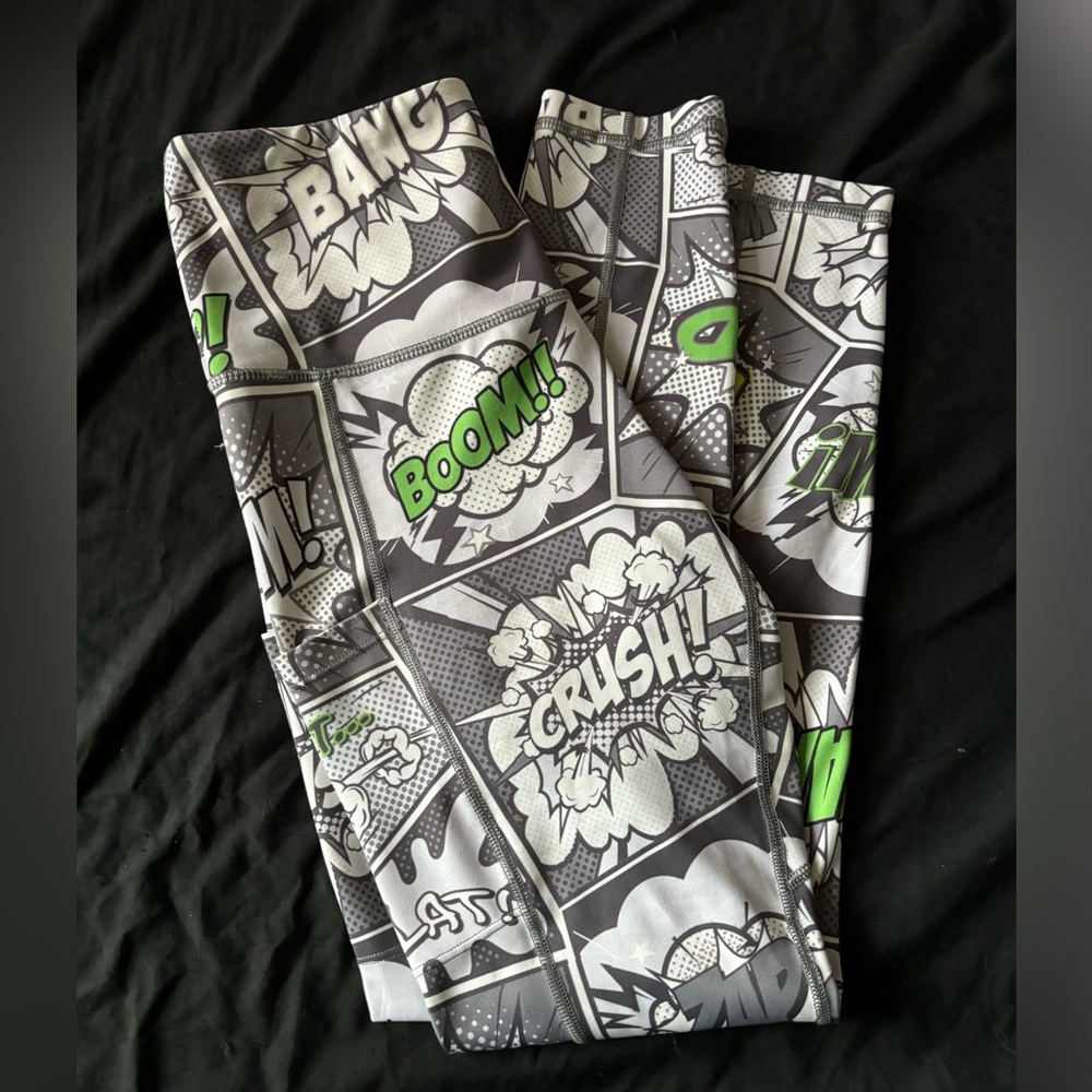 NWOT FEED ME FIGHT ME COMIC BOOK LEGGINGS